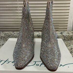 This is a short bedazzled cowboy boot made by Betsey Johnson.